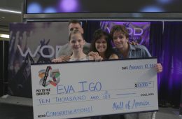 Eva Igo presented with check in hometown